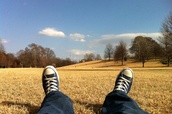 Listening to relaxing music in a field