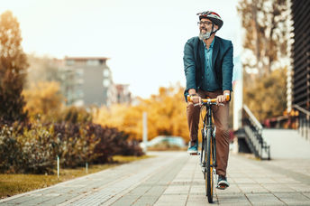 a man on a bicycle.