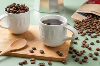 Espresso coffee and coffee beans.