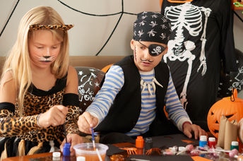 Woman in DIY Halloween makeup and costume.
