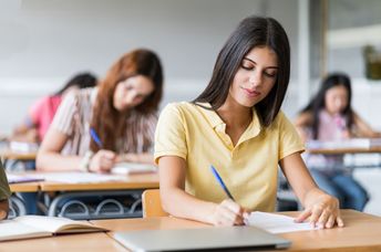Teens in classroom.
