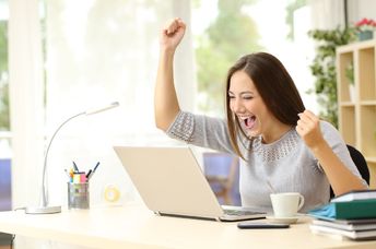 This woman is celebrating a success.