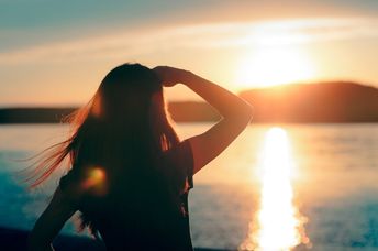 Hopeful woman looking towards the future.