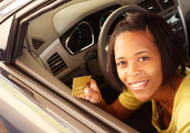 A woman pays with a credit card