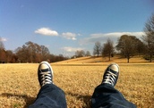 Listening to relaxing music in a field