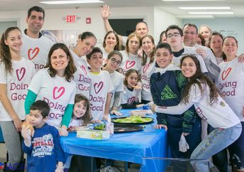 The crowd at Boston IAC gathers to honor International Good Deeds Day 2016. (Good Deeds Day)