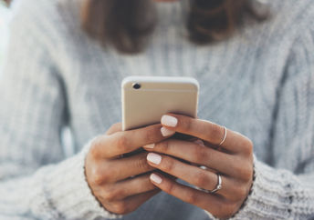Woman reads SMS