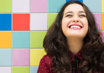 Woman laughing.