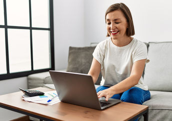 Using a laptop.