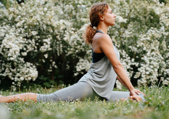 Doing yoga poses inspired by the air element.