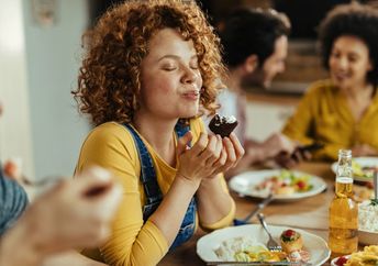 Woman enjoying her meal.