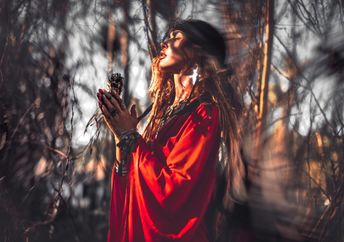 A spiritual woman in a forest.