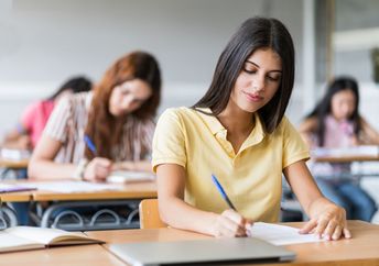 Teens in classroom.