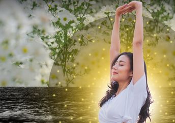 A woman meditating.