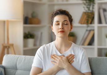 A woman looks calm.
