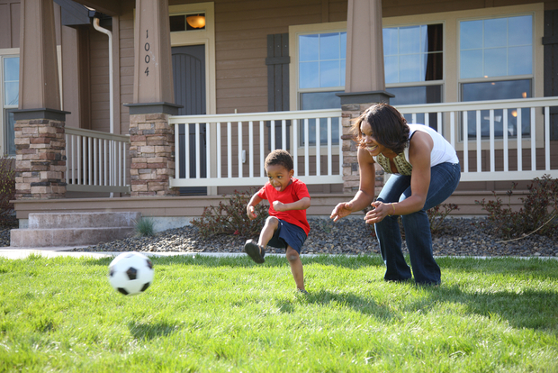 Soccer in the front yard Soccer in the front yard