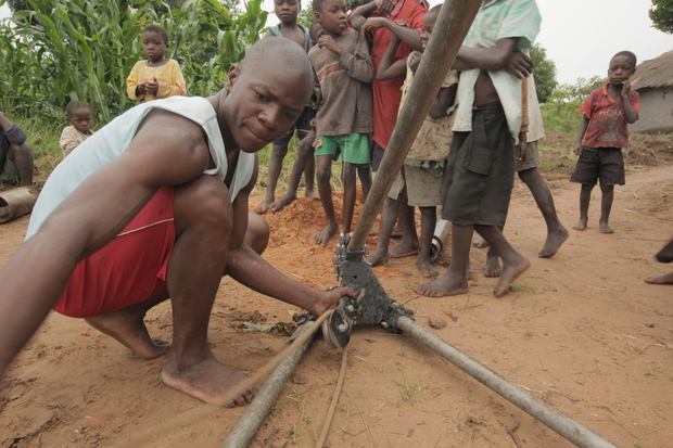 Jimmy, one of Water4's drill team leaders in Zambia, working on well components Jimmy, one of Water4's drill team leaders in Zambia, working on well components