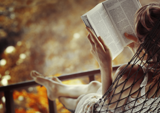 Woman reading a book Woman reading a book