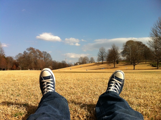 Listening to relaxing music in a field