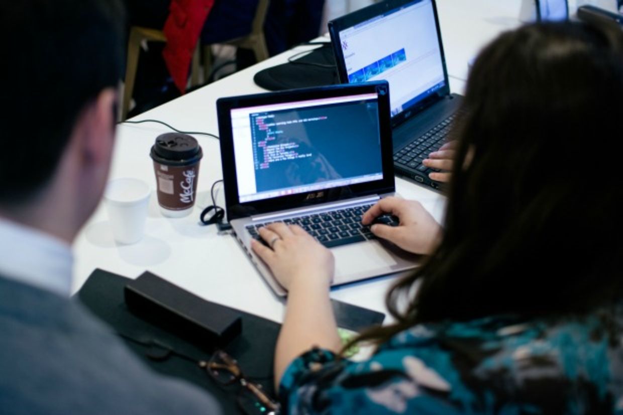 Ladies learning code during workshop Ladies learning code during workshop