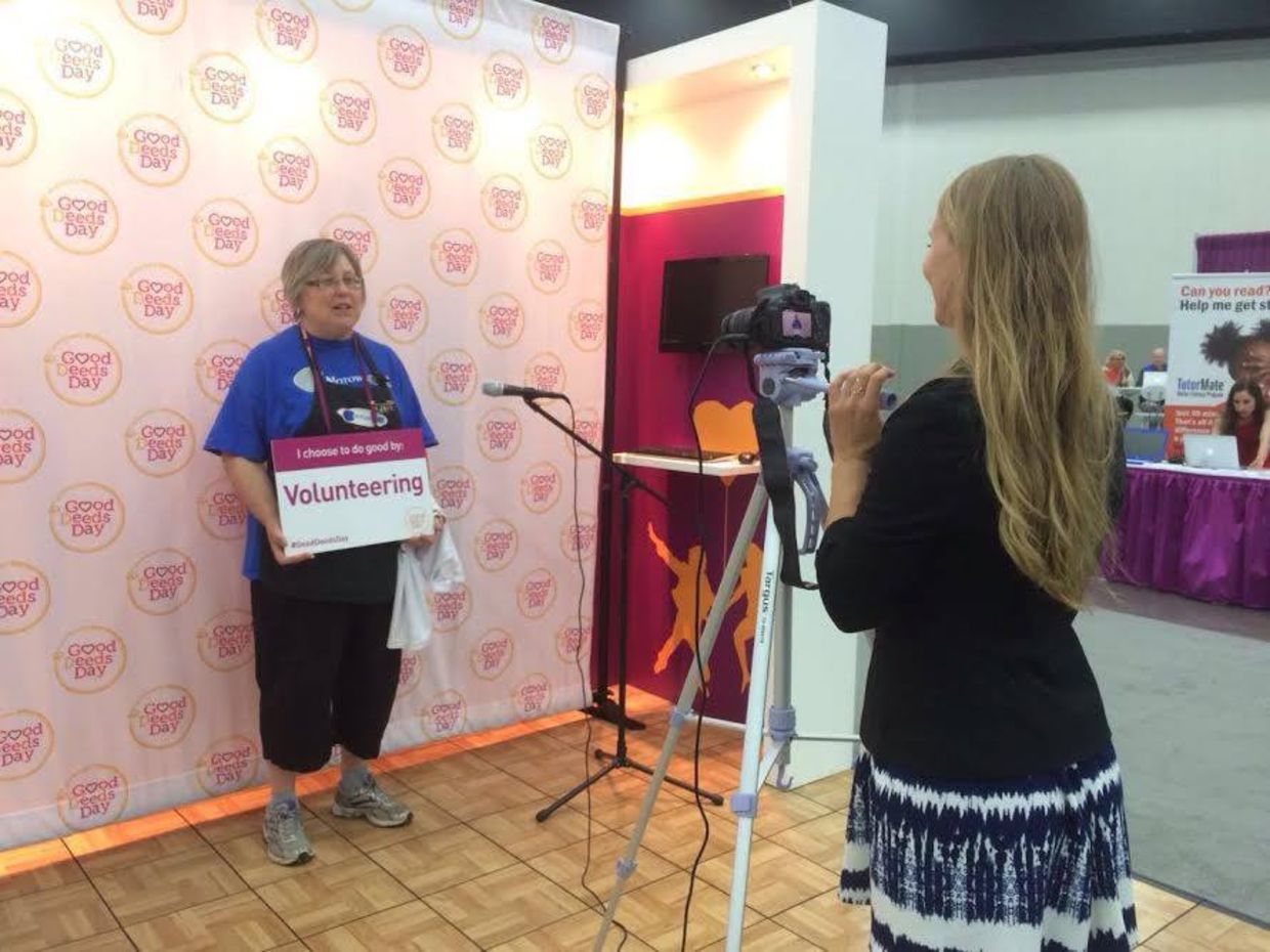 A participant at the Points of Light conference visits the Good Deeds Day booth. A participant at the Points of Light conference visits the Good Deeds Day booth.