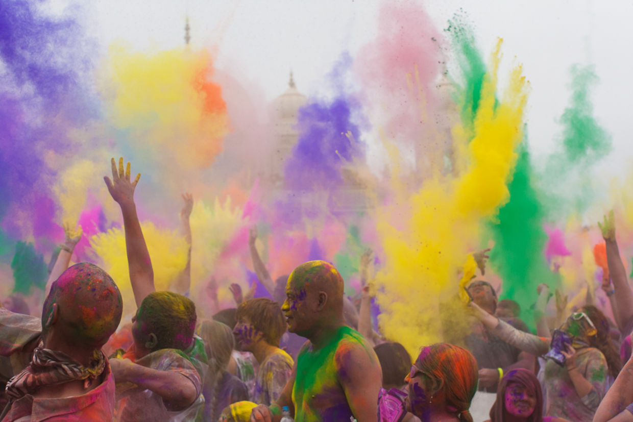 Devout Hindus toss bright shades of powder in the air to shower everyone with love and forgiveness. (Sam Breach/CC BY-NC-ND 2.0) Devout Hindus toss bright shades of powder in the air to shower everyone with love and forgiveness. (Sam Breach/CC BY-NC-ND 2.0)