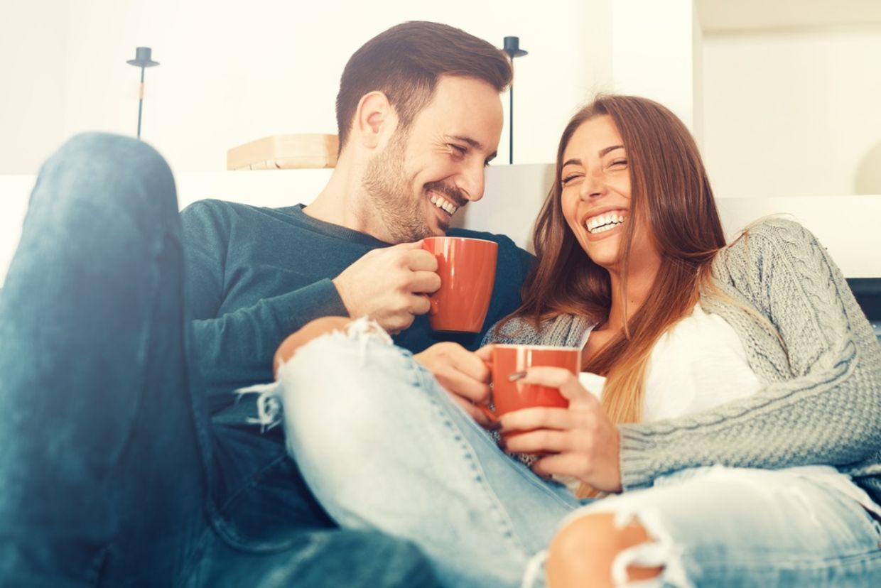 Cheerful young couple in the morning at home. Cheerful young couple in the morning at home.