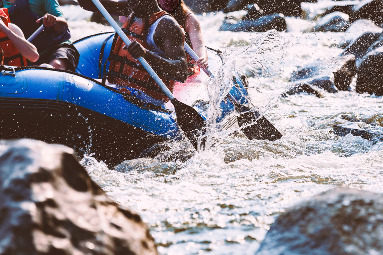 take a risk - Close-up of young person rafting on the river take a risk - Close-up of young person rafting on the river