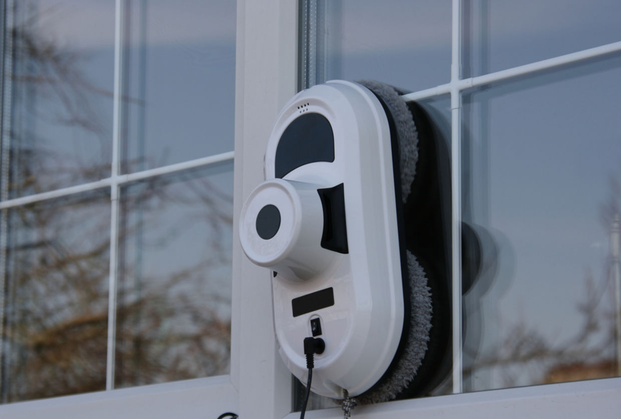 Home robot cleaning windows