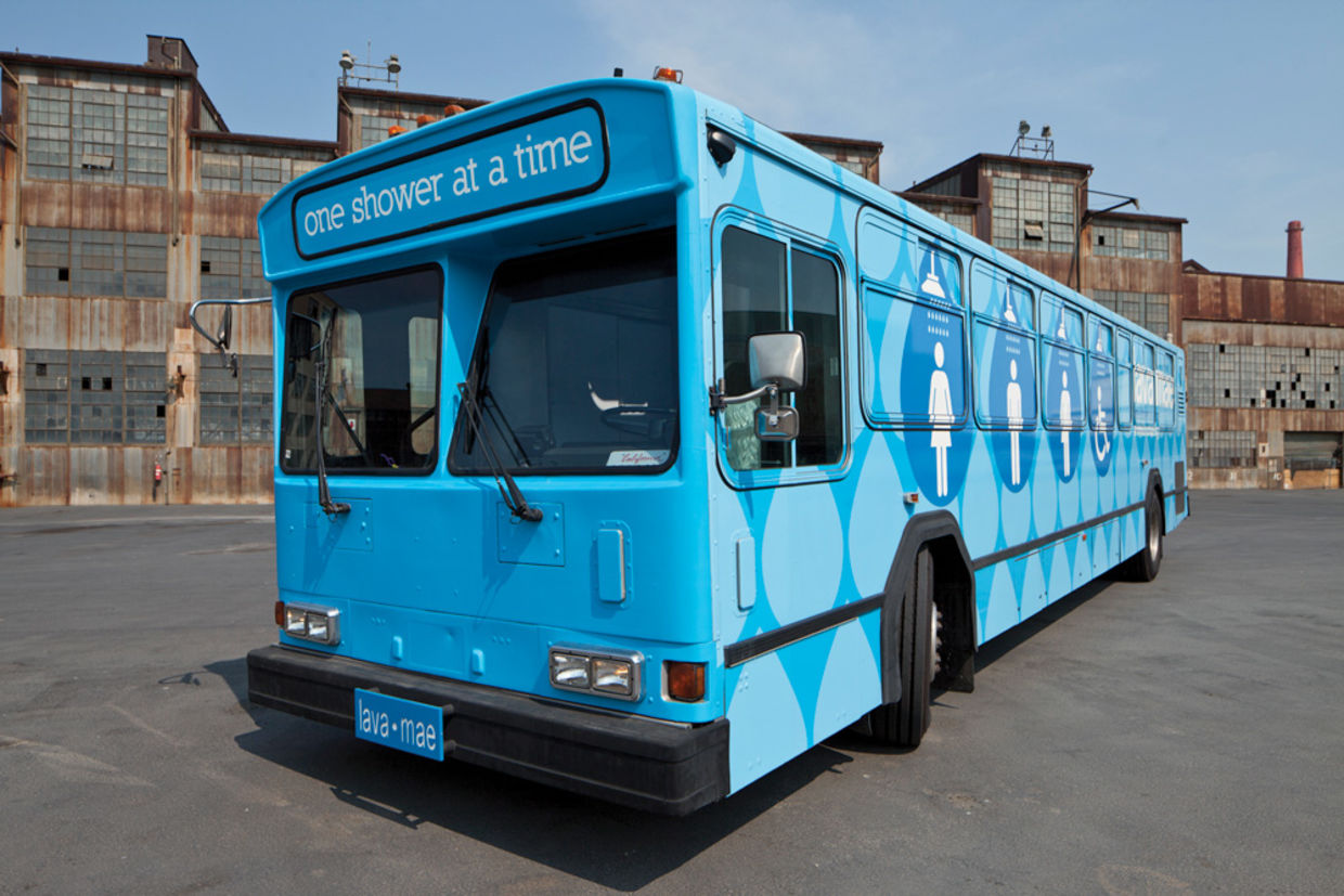 People living on the street come to the Lava Mae bus to take showers.