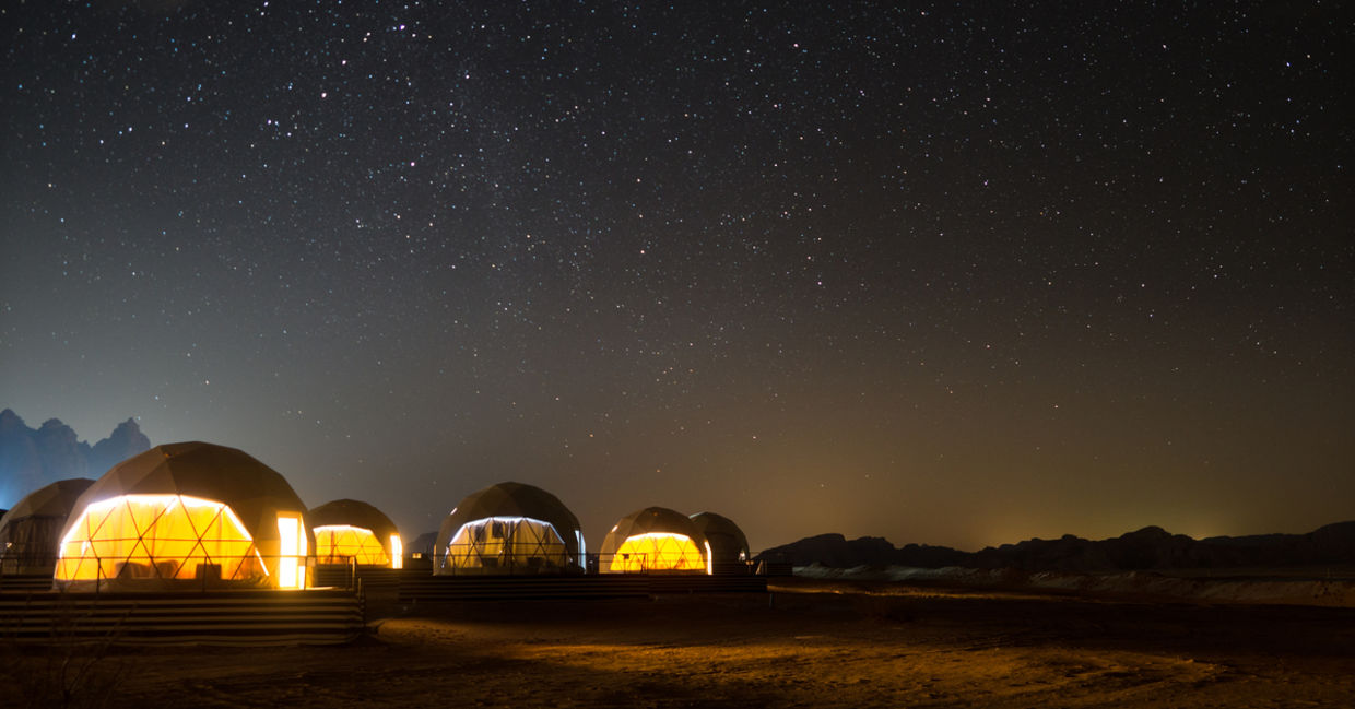 Stars above martian dome tents in Wadi Rum Desert, Jordan Stars above martian dome tents in Wadi Rum Desert, Jordan