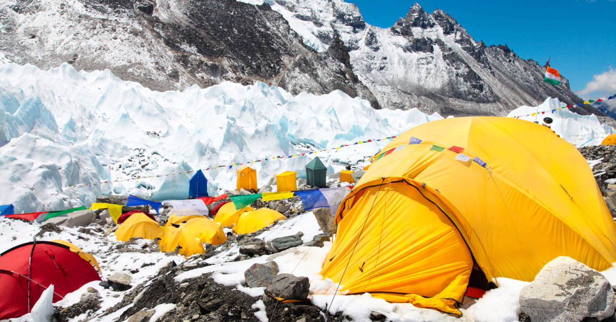 Bright yellow tents in Mount Everest base camp, Khumbu glacier and mountains, sagarmatha national park, trek to Everest base camp Bright yellow tents in Mount Everest base camp, Khumbu glacier and mountains, sagarmatha national park, trek to Everest base camp