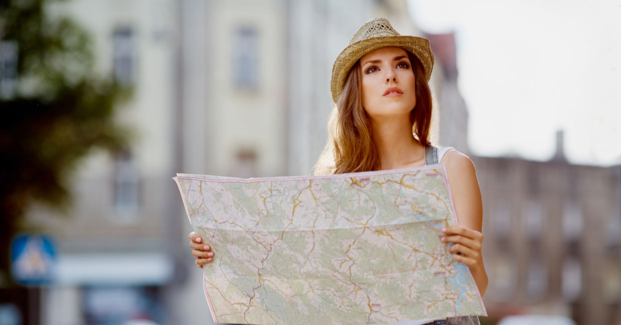 Best Jobs in the World - A woman is looking at a map while traveling abroad. (Shutterstock) Best Jobs in the World - A woman is looking at a map while traveling abroad. (Shutterstock)