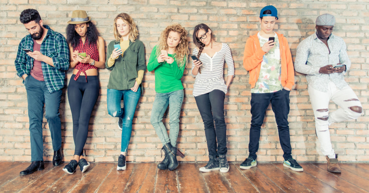 People connecting with their phones People connecting with their phones