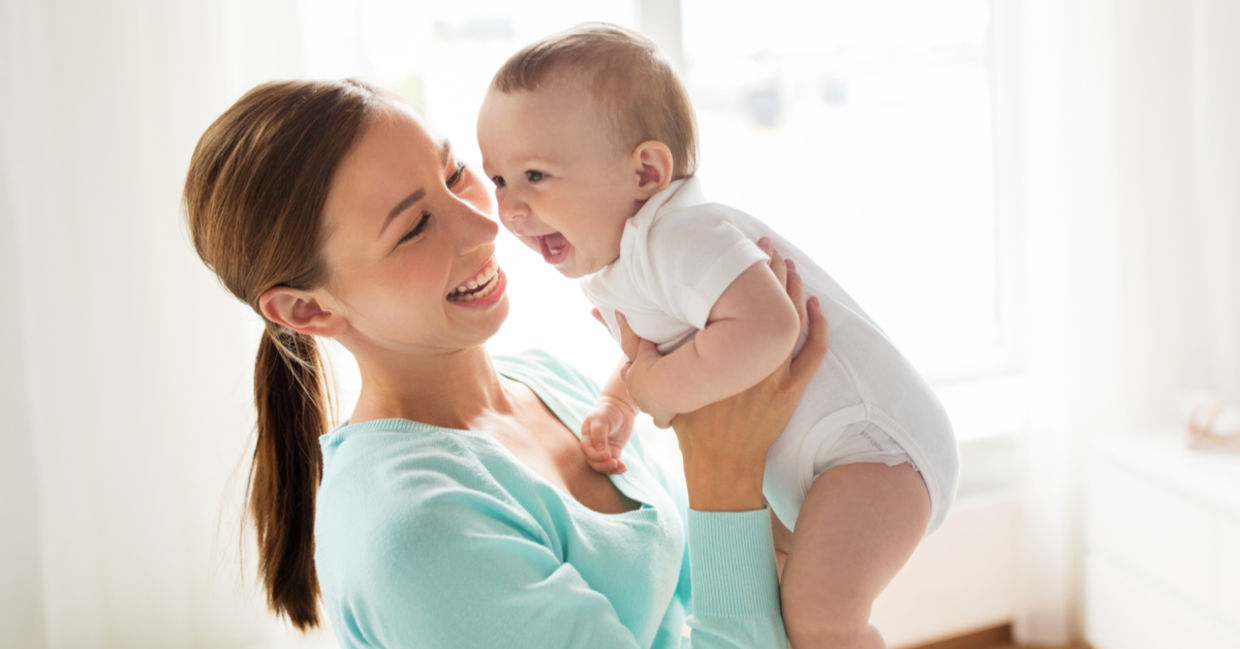 A happy mother and baby playing A happy mother and baby playing