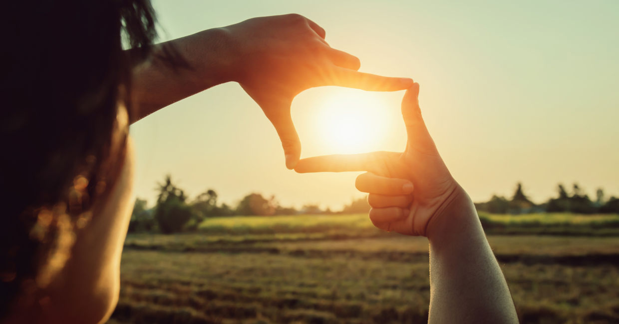 Hands framing the sun Hands framing the sun