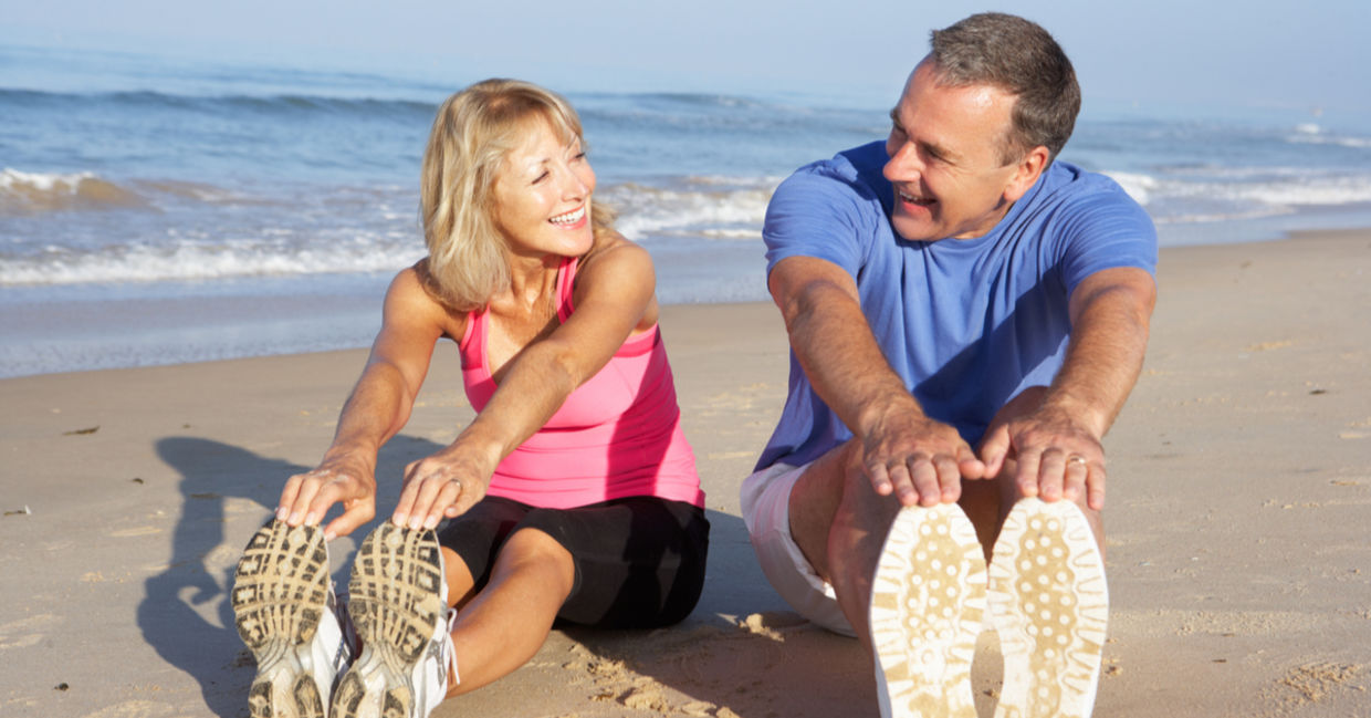 A couple stretching on the beach may have reduced hypertension. A couple stretching on the beach may have reduced hypertension.