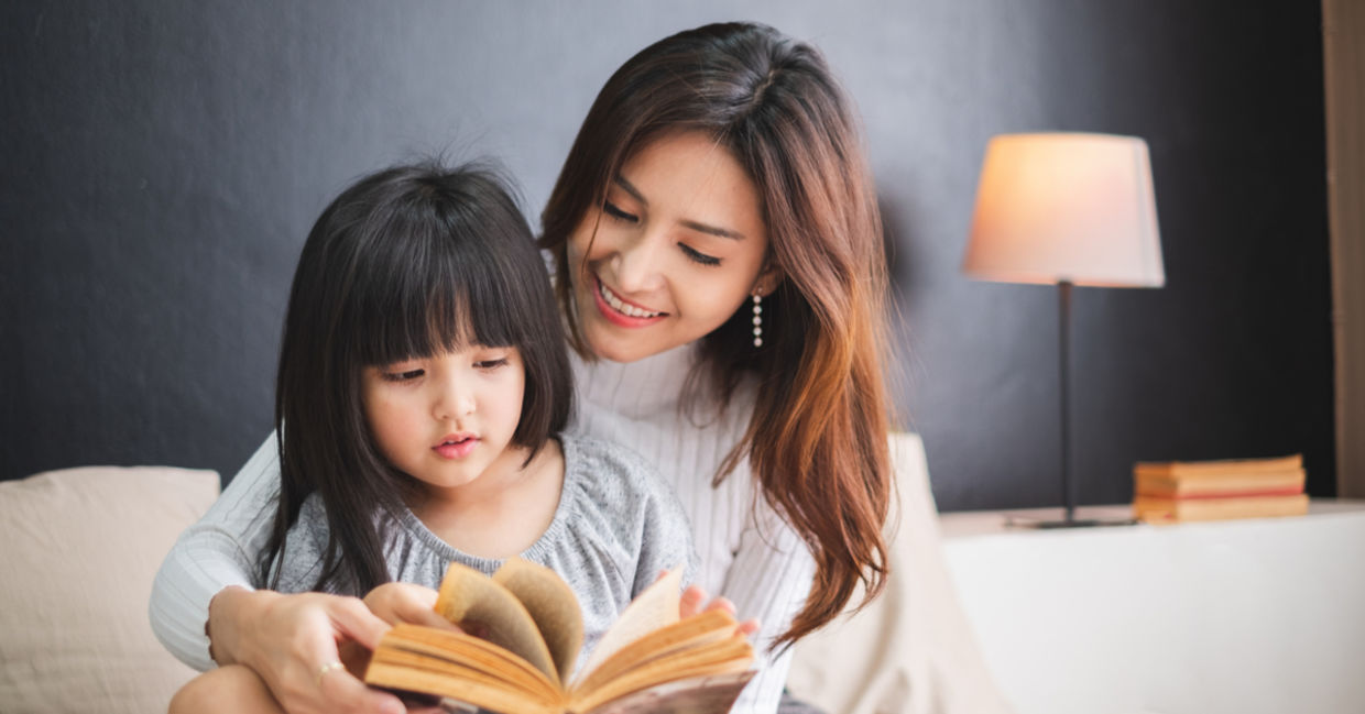 Mother reading to child. Mother reading to child.