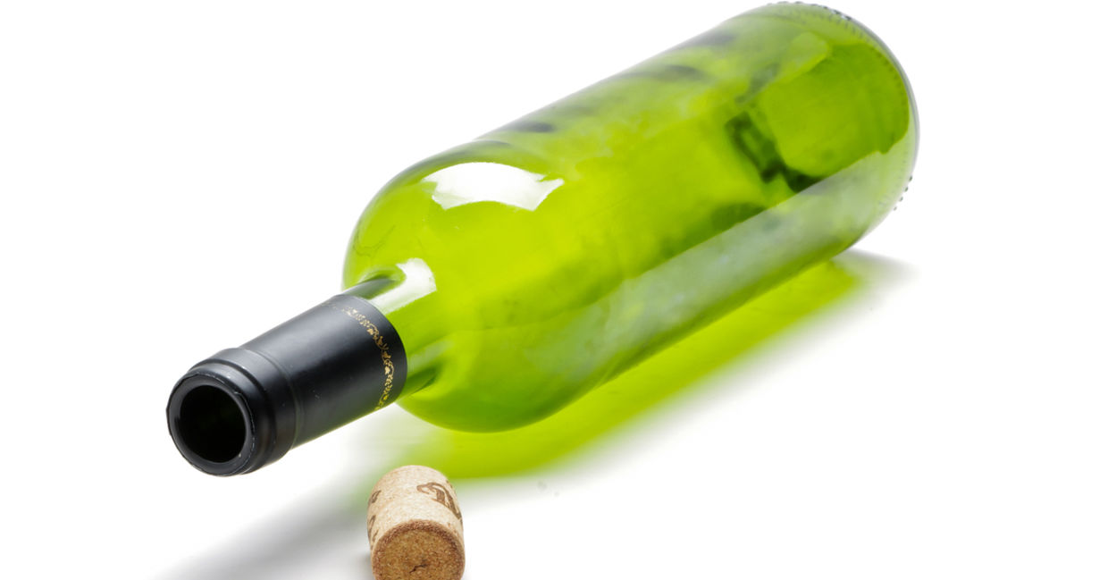Empty wine bottles to be repurposed. Empty wine bottles to be repurposed.
