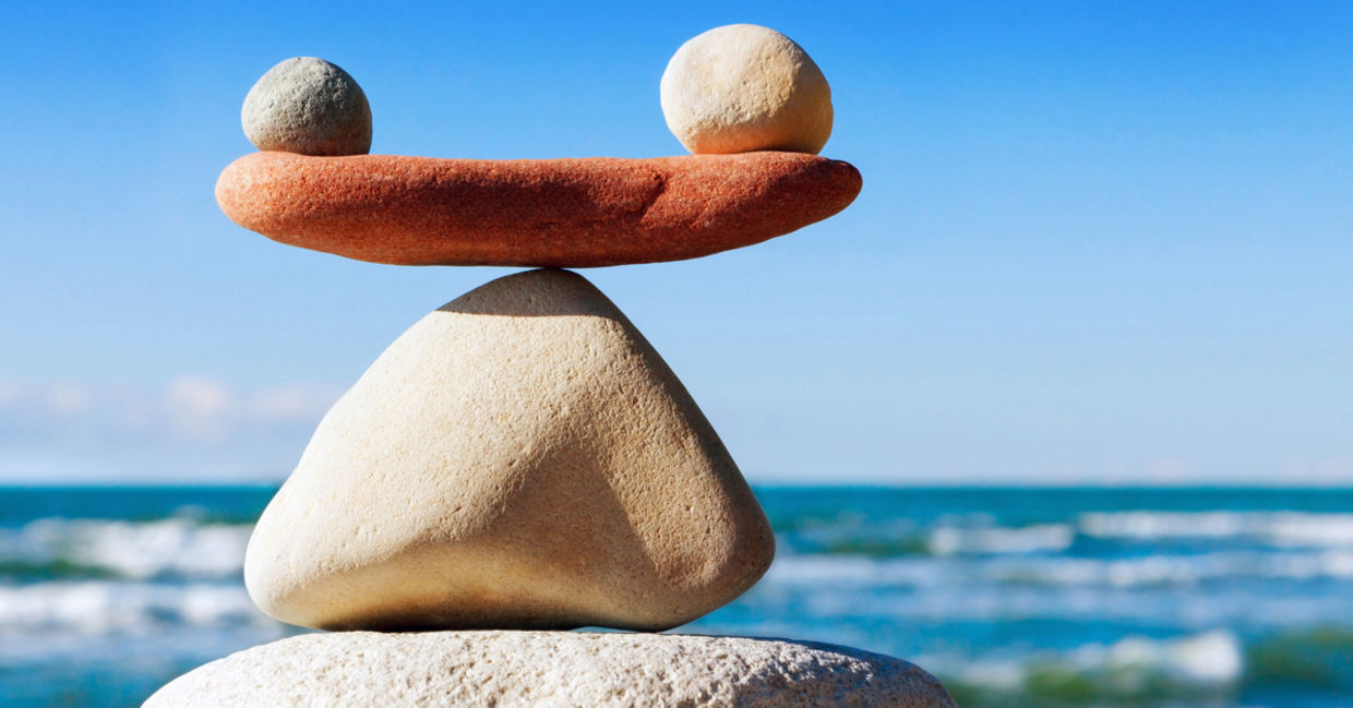 A photograph of stones in balance to convey work life balance A photograph of stones in balance to convey work life balance