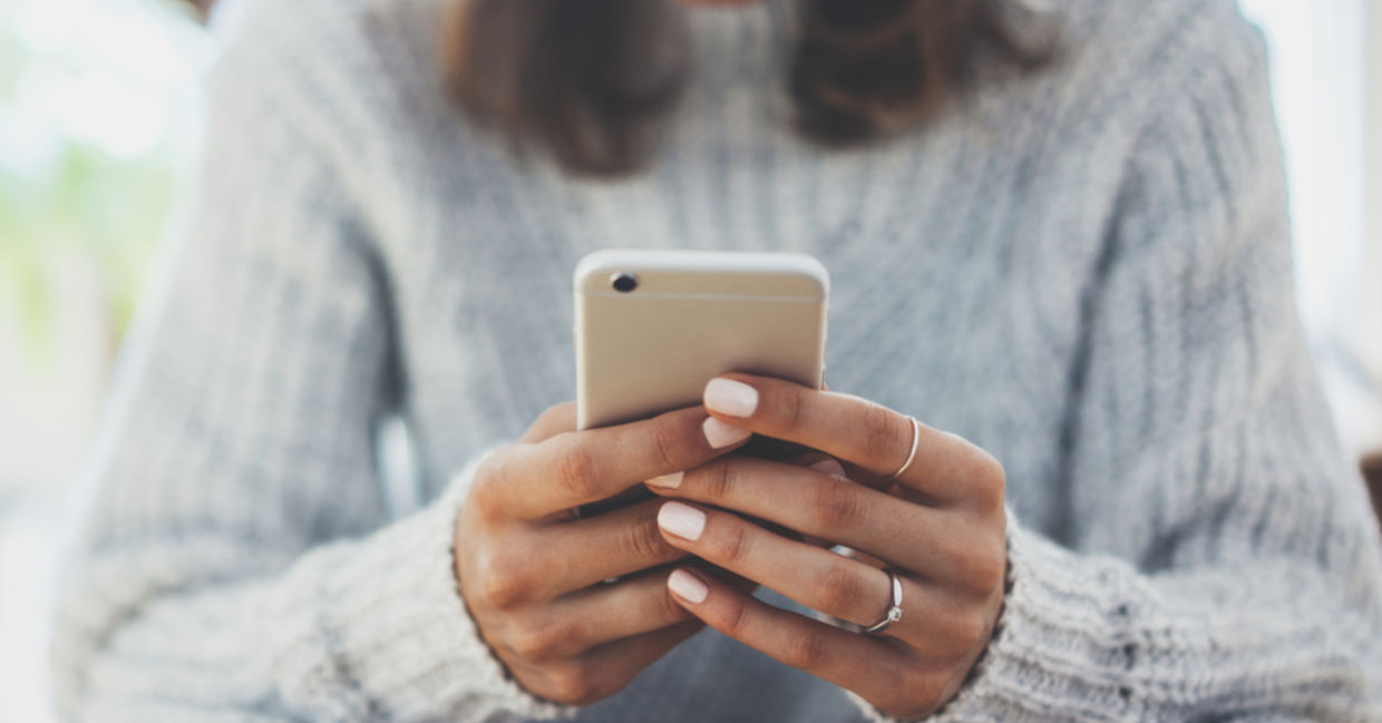 Woman reads SMS Woman reads SMS