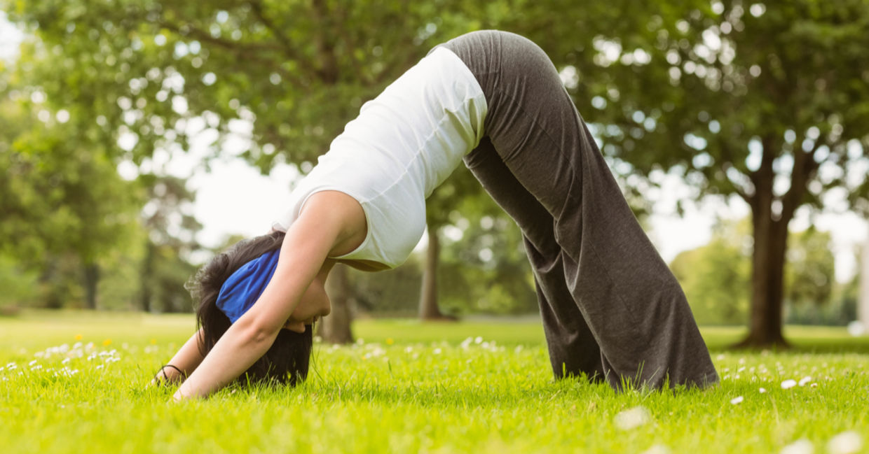 Woman doing the dolphin yoga pose. Woman doing the dolphin yoga pose.