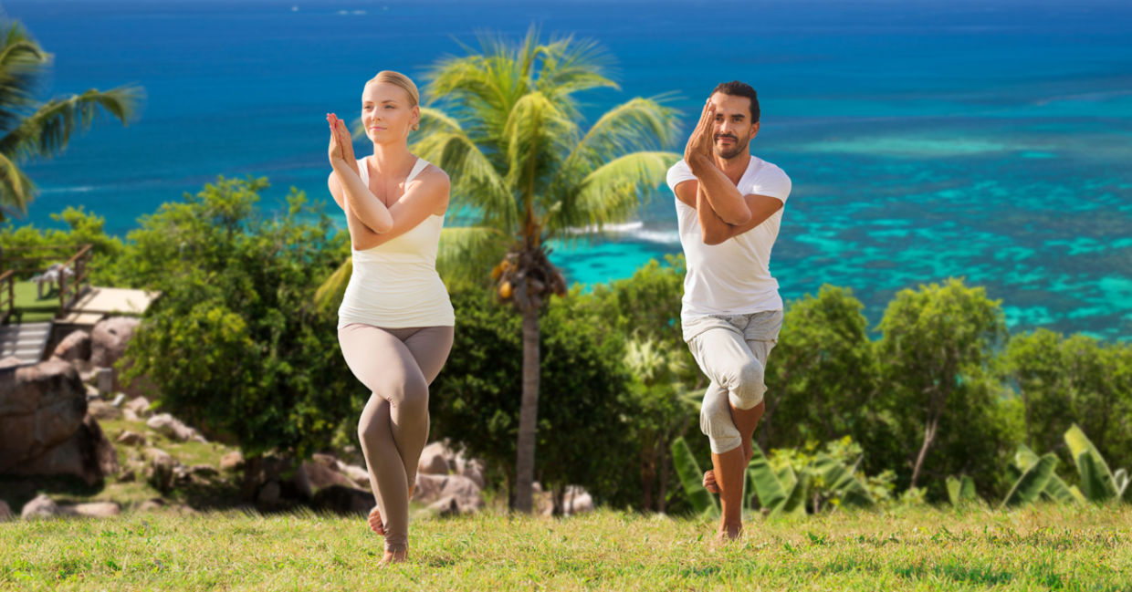 This couple is doing the eagle pose. This couple is doing the eagle pose.