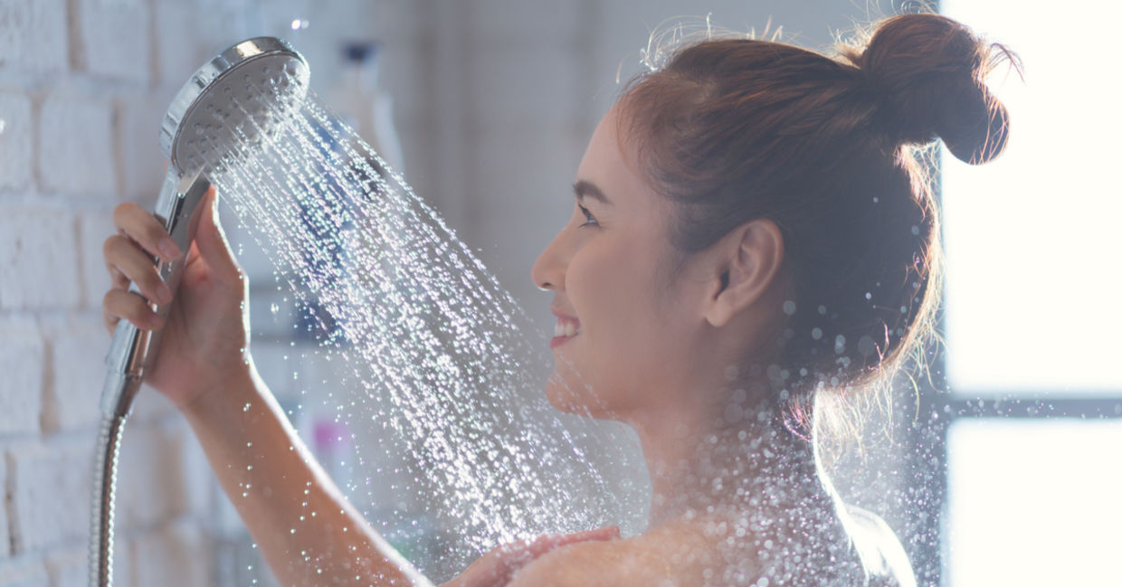 A woman showering A woman showering