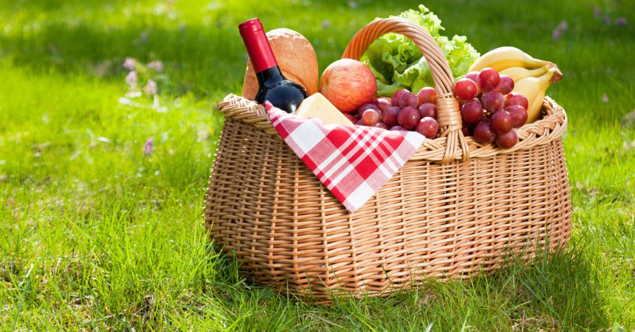 A picnic basket on grass A picnic basket on grass