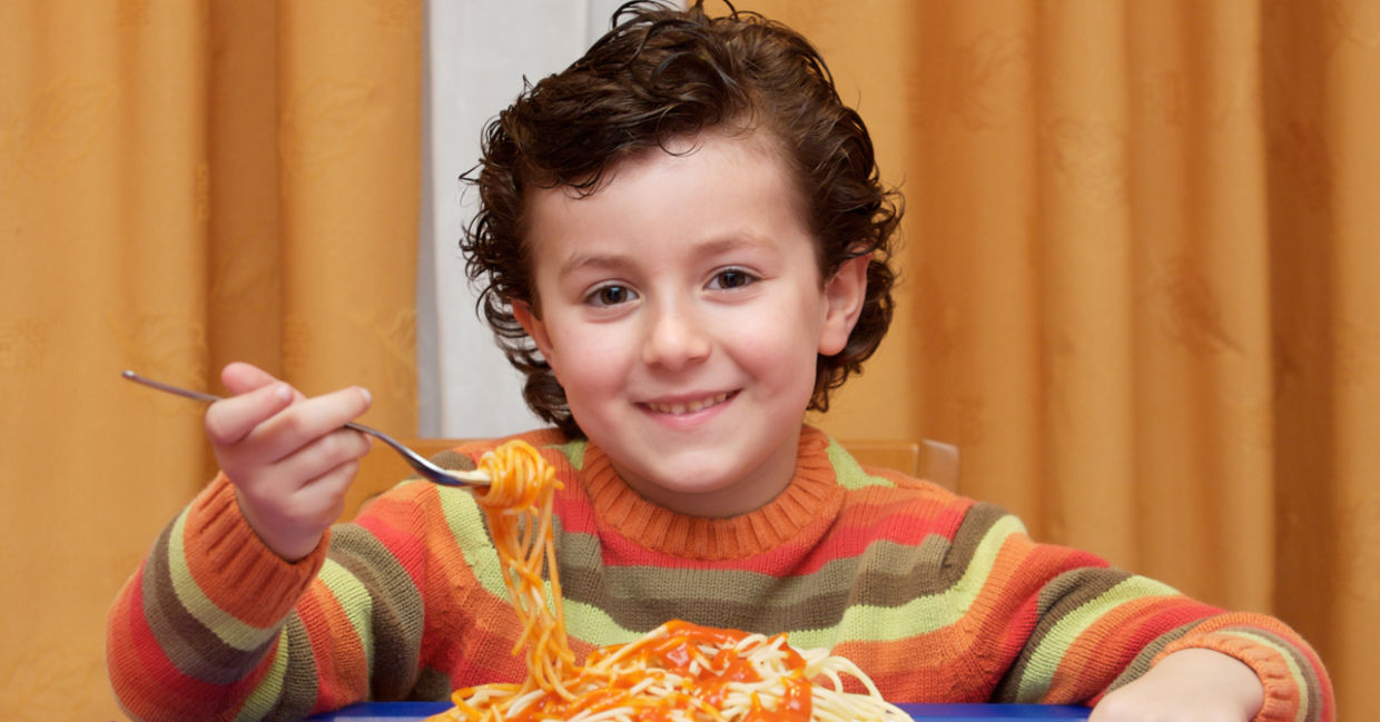 This boy is eating a healthy and nutritious kid-friendly meal. This boy is eating a healthy and nutritious kid-friendly meal.