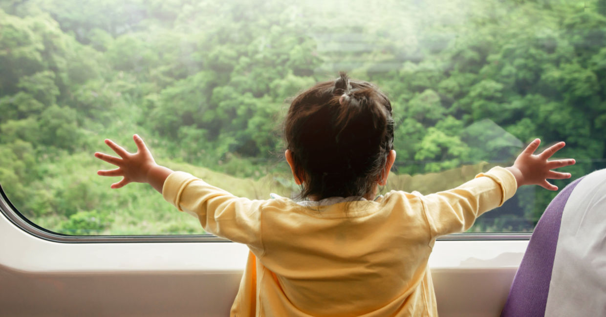 Boy enjoying scenic train travel Boy enjoying scenic train travel