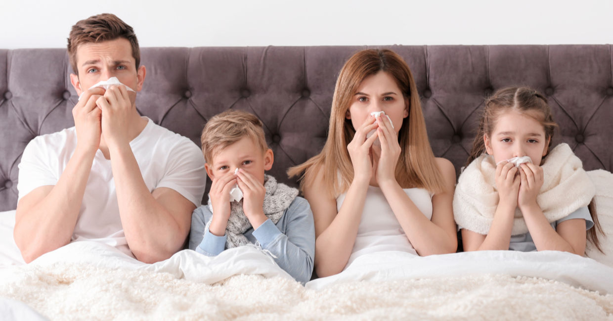 Parents and children in bed with a cold. Parents and children in bed with a cold.