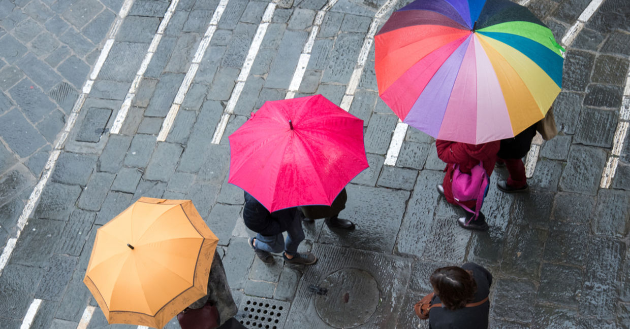 Pedestrians on a rainy day in the city. Pedestrians on a rainy day in the city.