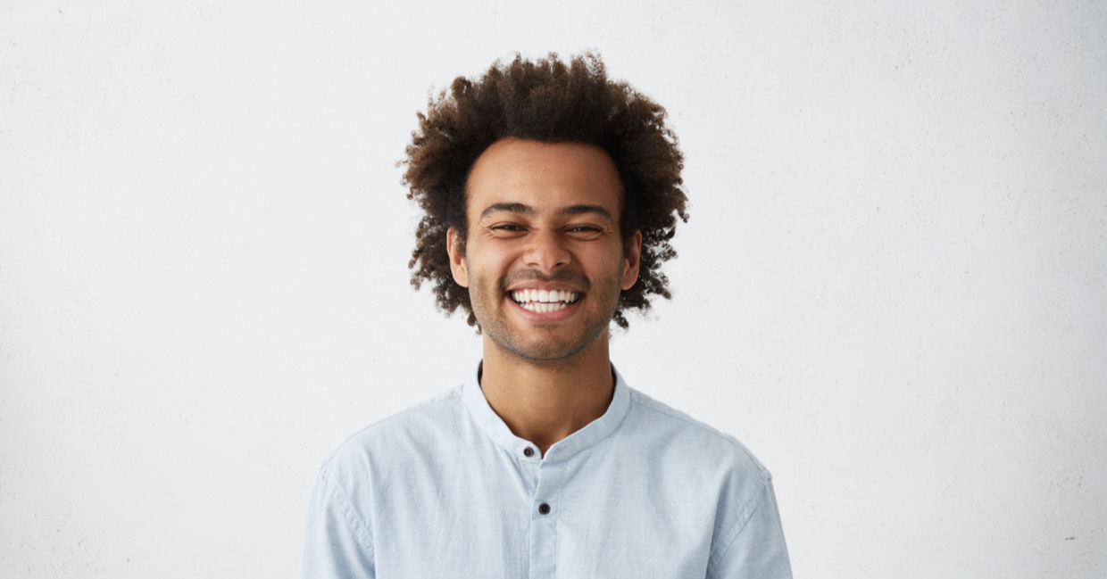 a happy smiling man. a happy smiling man.